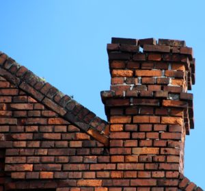 crumbling brick chimney